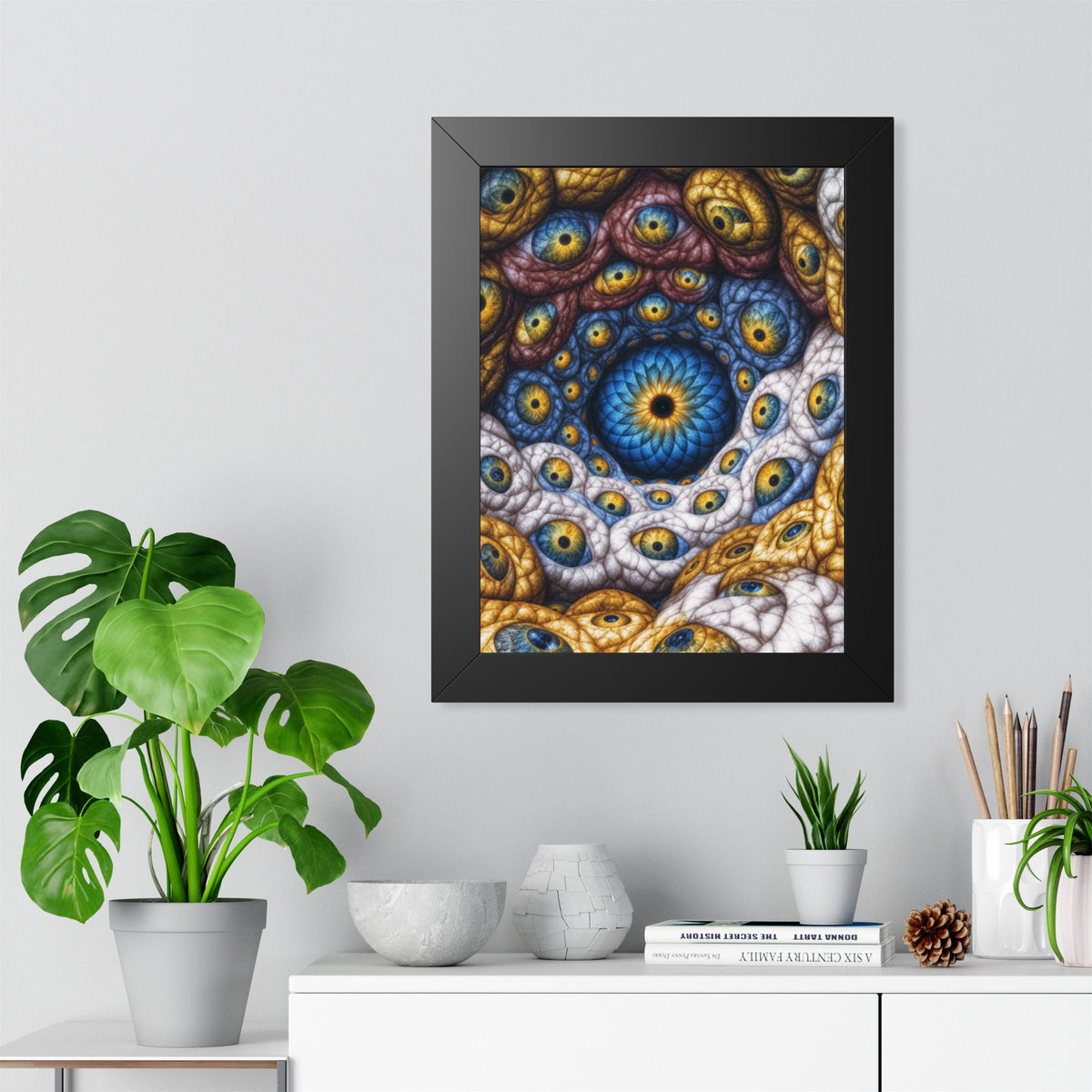 The Many Eyes of One Awareness — Black Framed Print, 12 × 16 in — interwoven blue and gold eyes in ivory, ochre and mauve forms