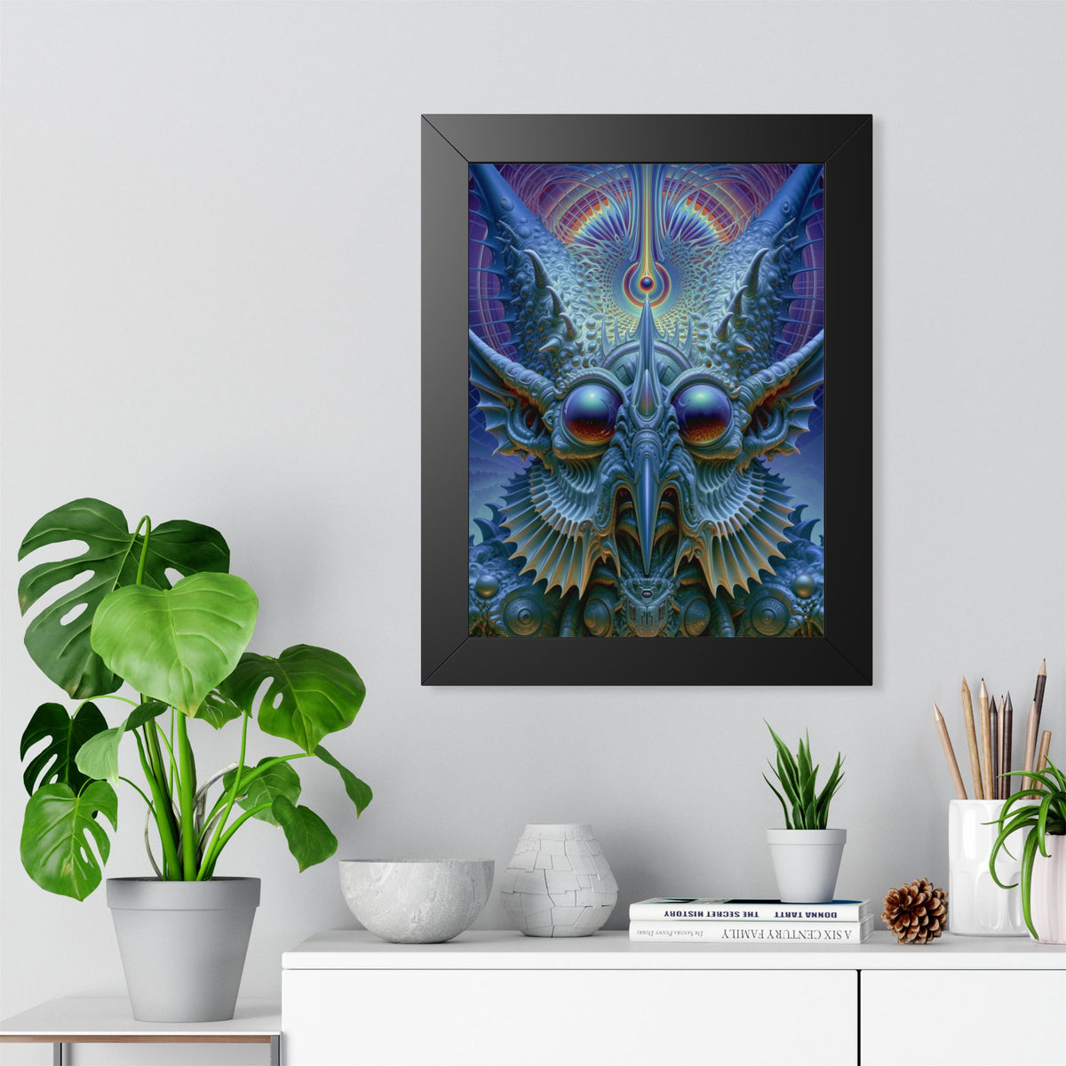 The Threshold That Refines — Black Framed Print, 12 × 16 in — a symmetrical blue guardian with reflective eyes, pointed horns and intricate geometry